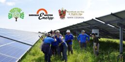 Photo of people on Burnham & Weston Energy's solar farm